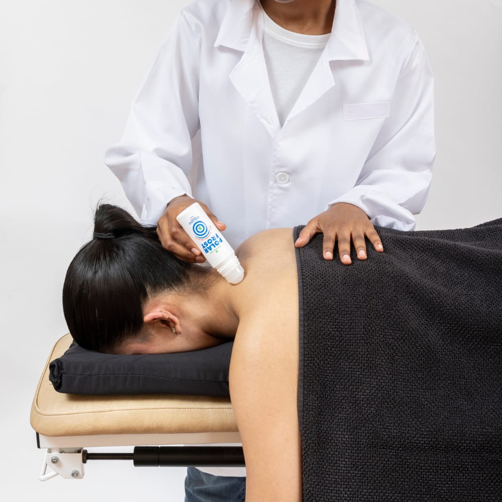 Clinician applying Polar Frost treatment to patient using face cushion